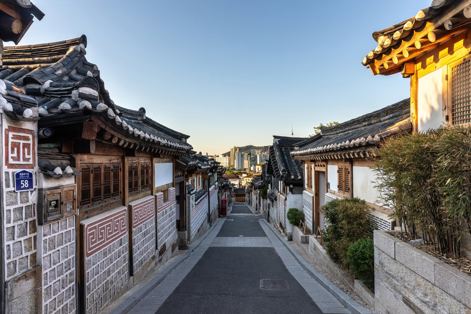 Hanok rooftops along Bukchon-ro 11-gil at sunrise, Bukchon Hanok Village, Seoul
