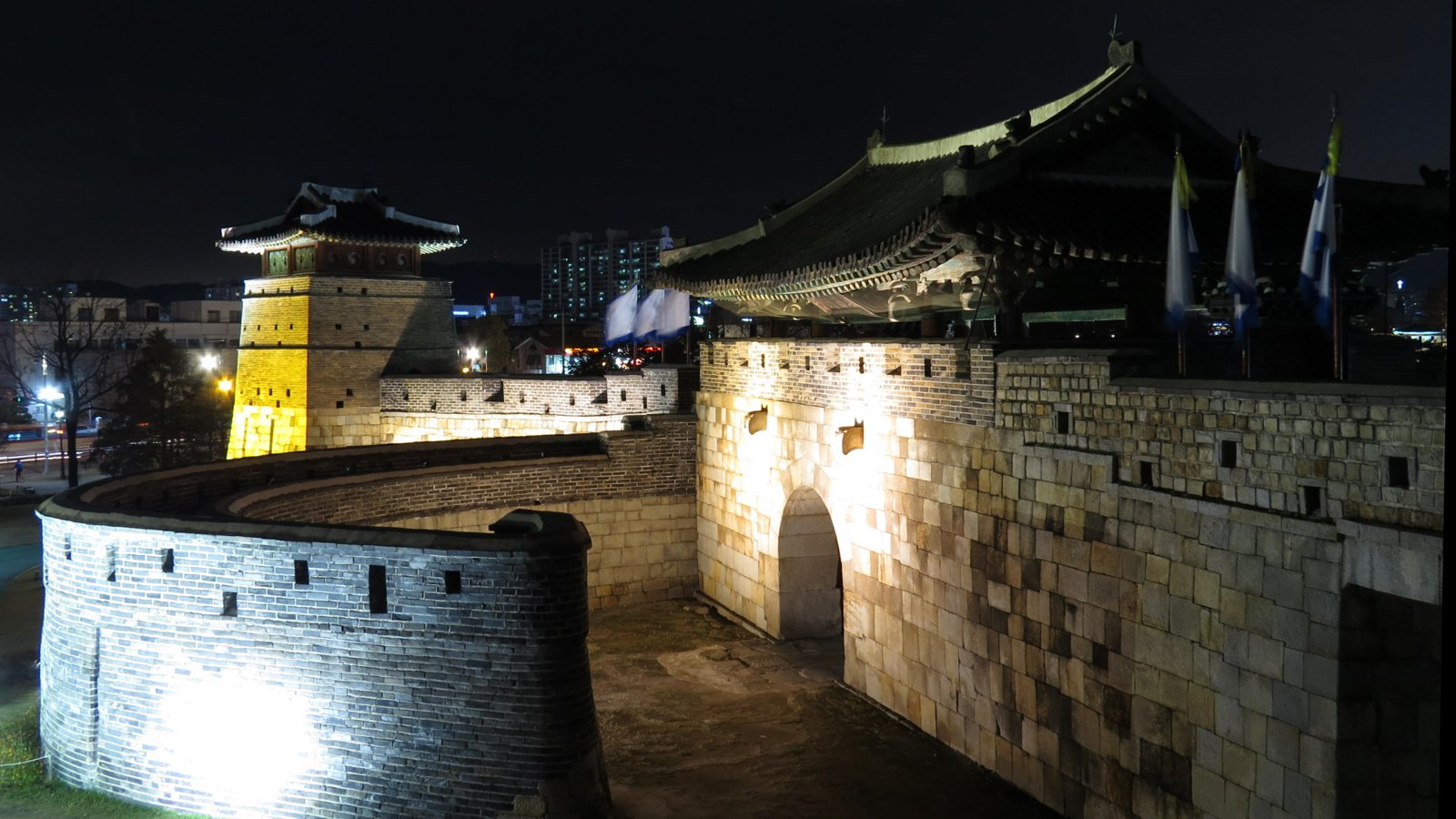 Hwaseomun at night, November 2015. Archive photograph, not a performance at the 2026 festival.