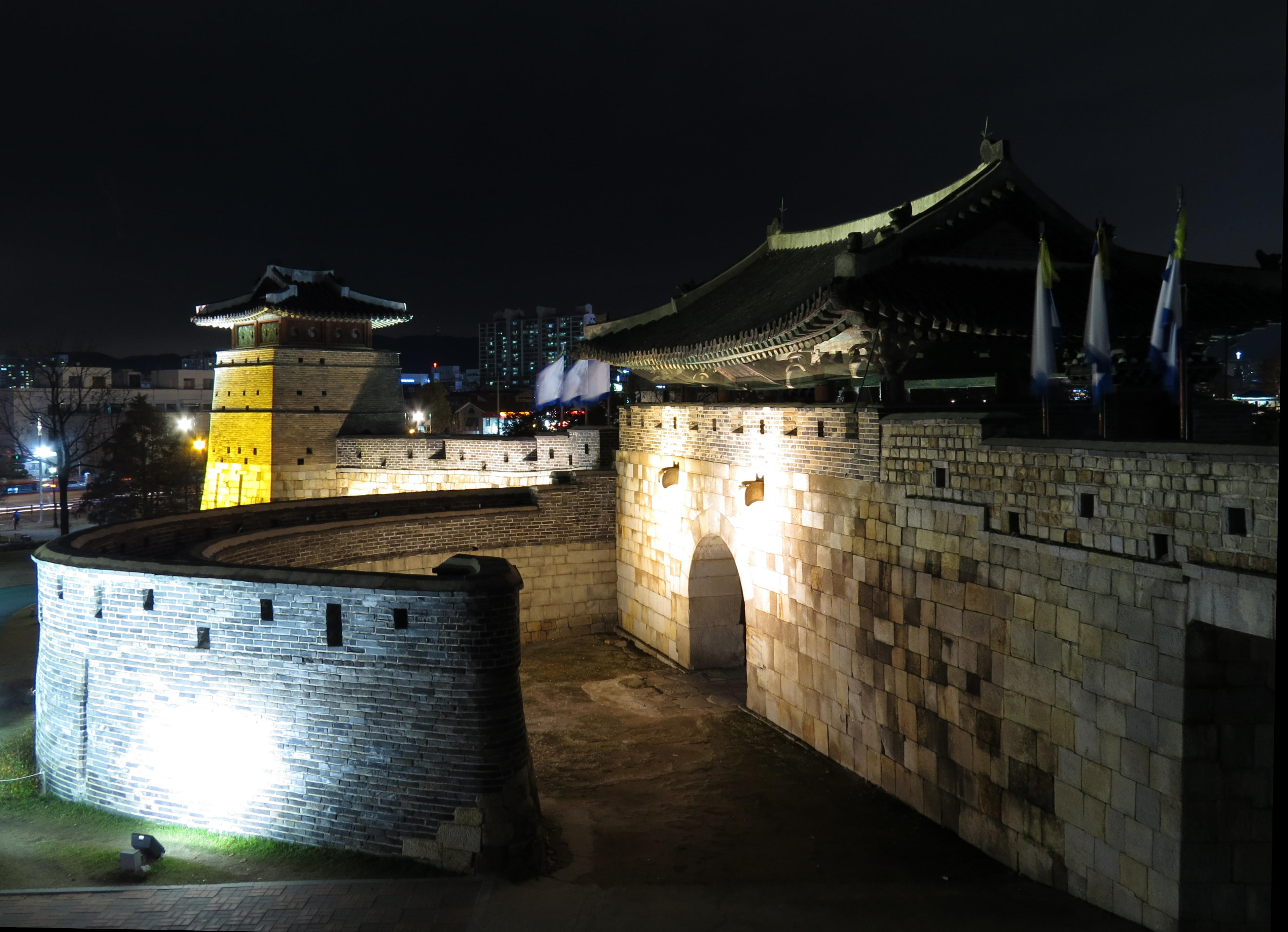 Hwaseomun at night in November 2015. Archive photograph of the gate, not the 2026 Media Art show.