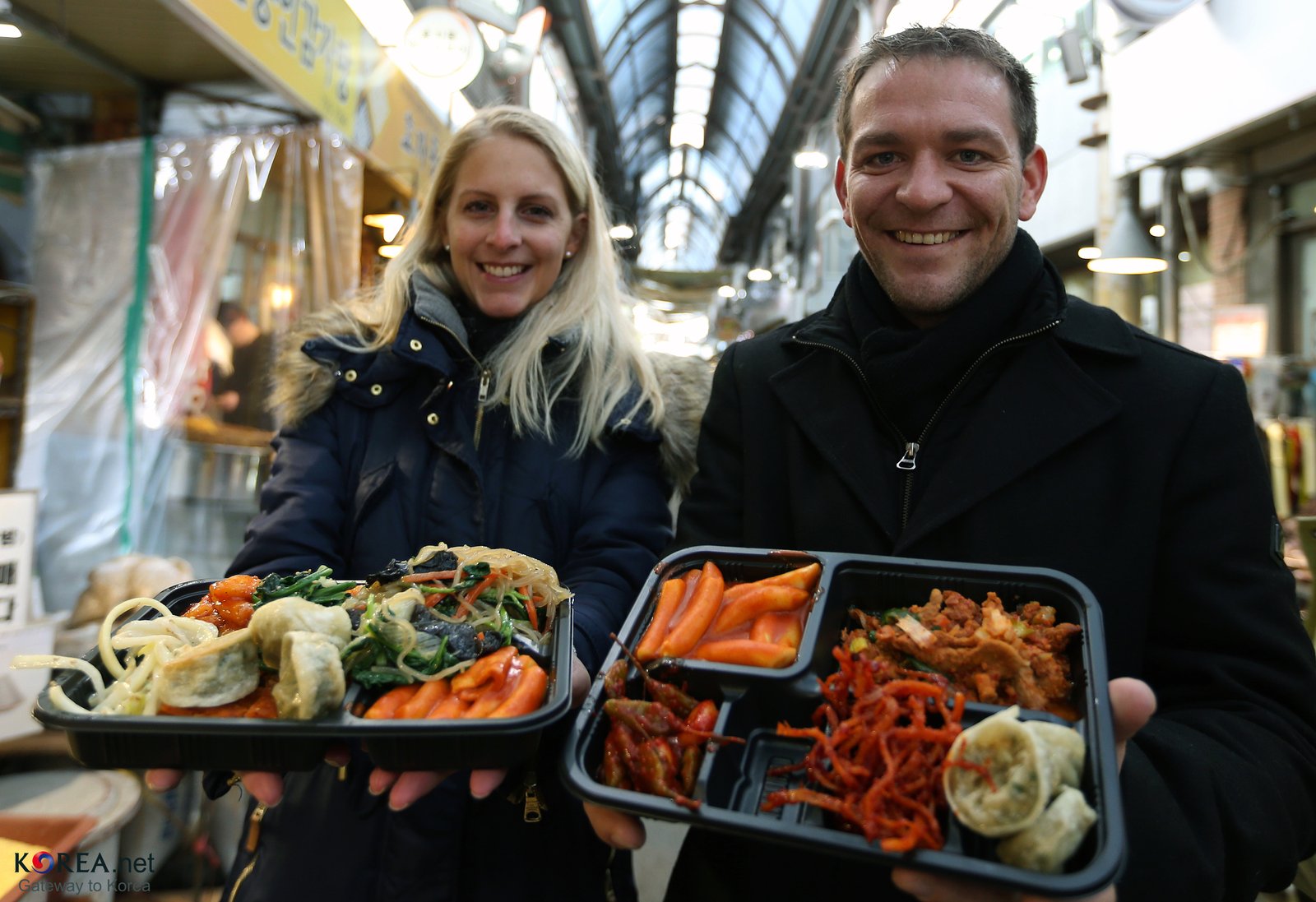 Covered arcade of Tongin Market in Seochon, Seoul, lined with food stalls